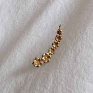 Gold flower ear climber